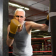 Illustration for article titled Mike Pence Training For Vice Presidential Debate By Hitting Punching Bag With Climate Change Study Taped On Front